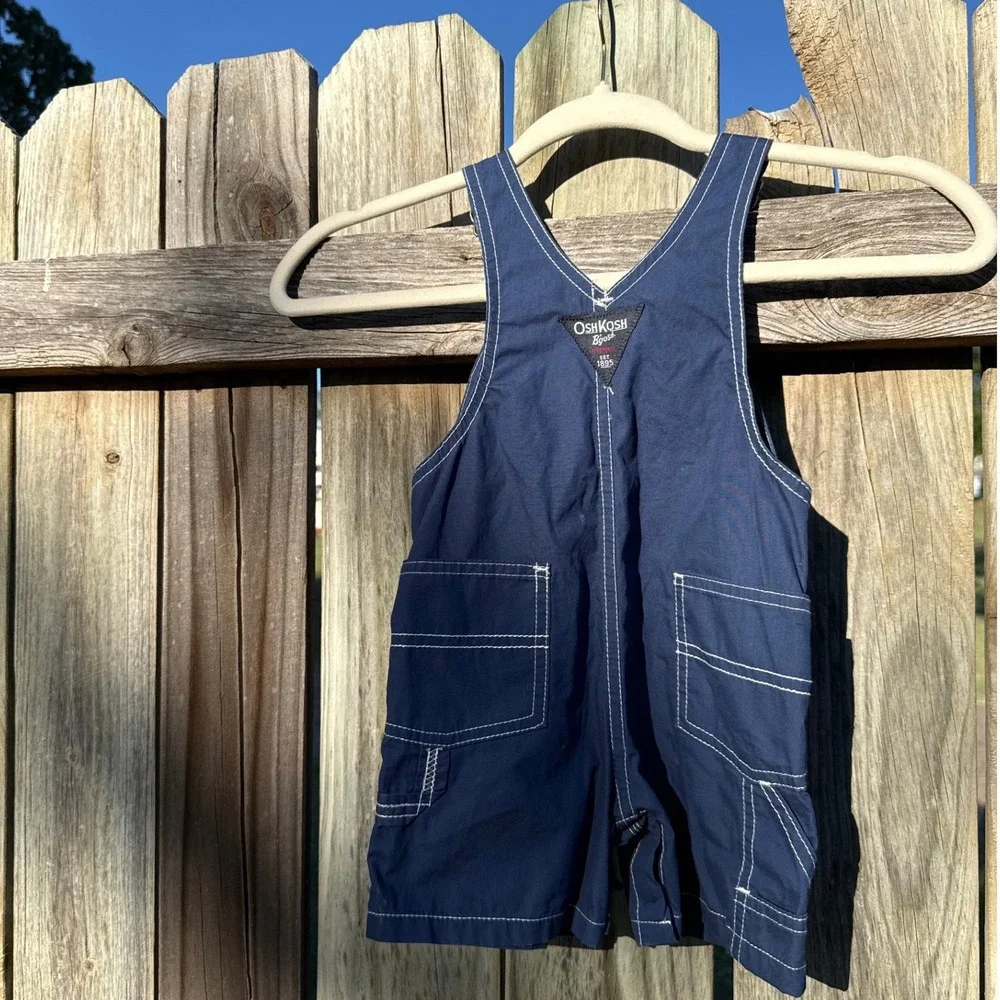 Vintage OshKosh B'gosh Made In USA Blue Canvas Overalls Shorts Snap Inseam